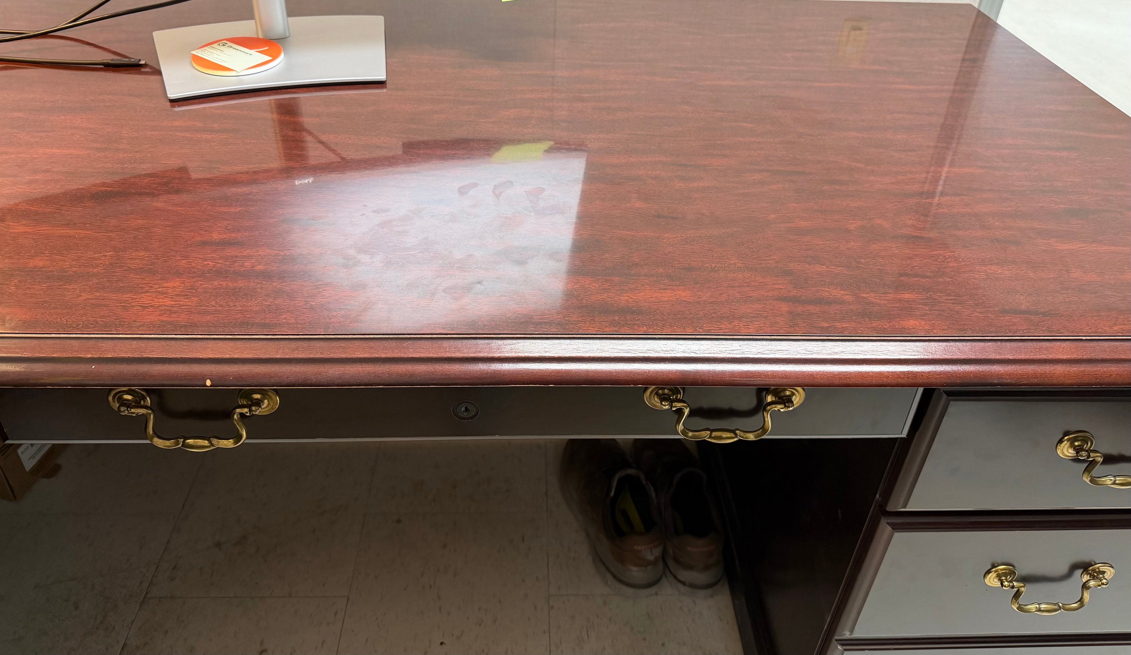 Scuffed dull commercial floor before strip and wax